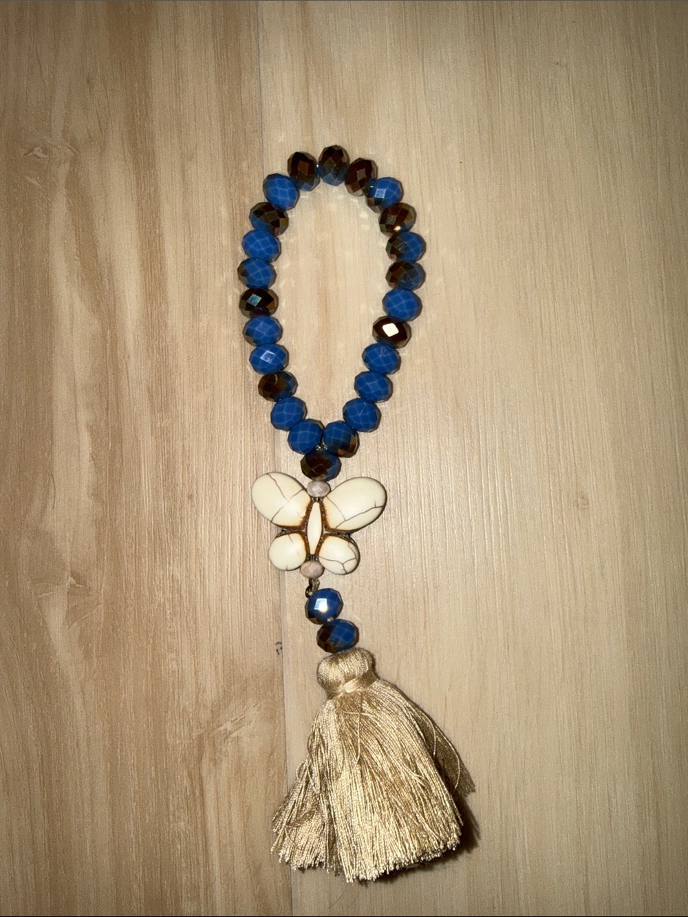 Blue Beaded Bracelet with White Butterfly and beige Tassel